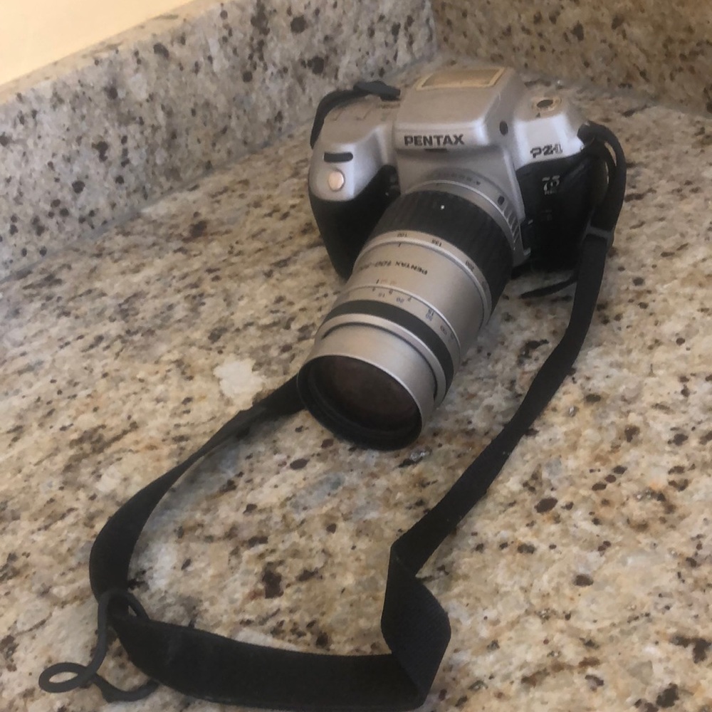Pentax film PZ1 camera with 100-300 lens.